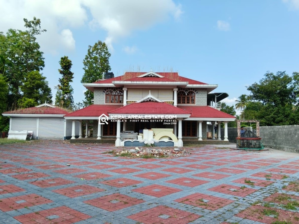 SPACIOUS 25 CENTS OF LAND WITH HOUSE FOR SALE NEAR NEDUMBASSERY AIRPORT, ERNAKULAM